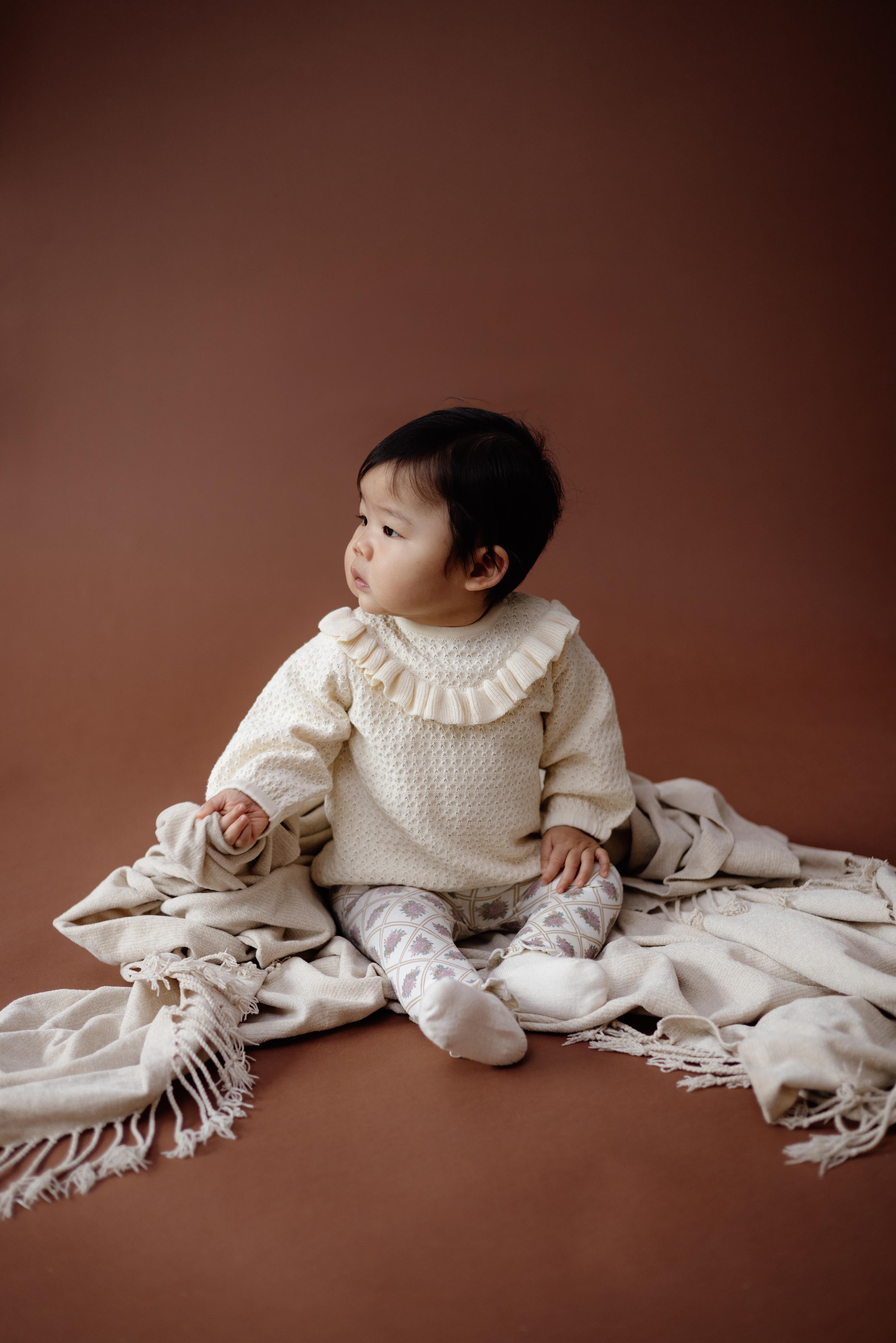 Crèmekleurige sweater met ruchekraag | White Cream
