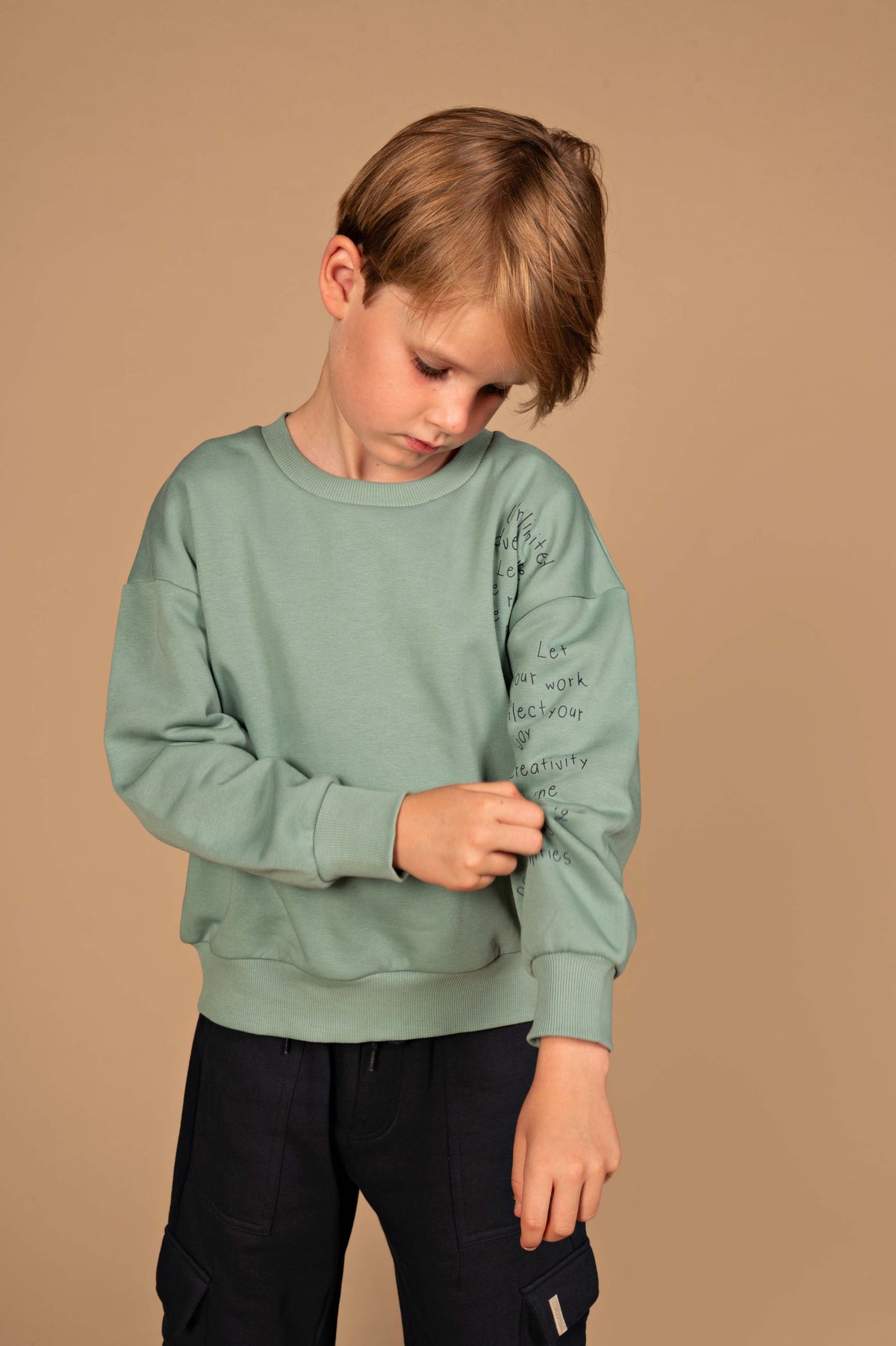 Mintgroene sweater met tekstprint | Teal