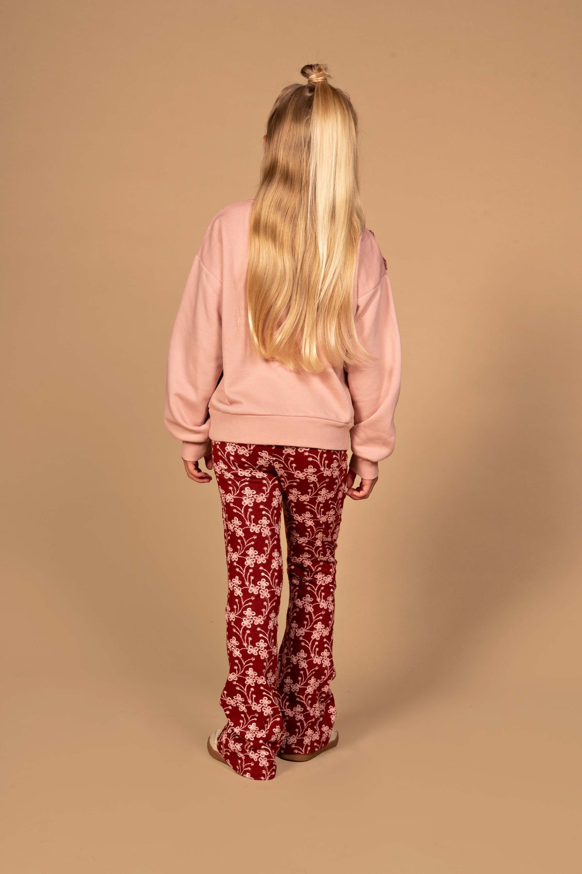 Rode flared broek met witte bloemenprint | AOP Red Flower